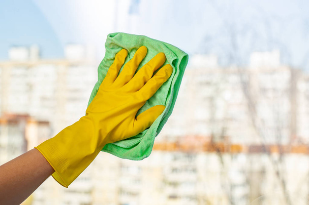 Cleaning windows with special rag. spring cleaning - Photo, Image