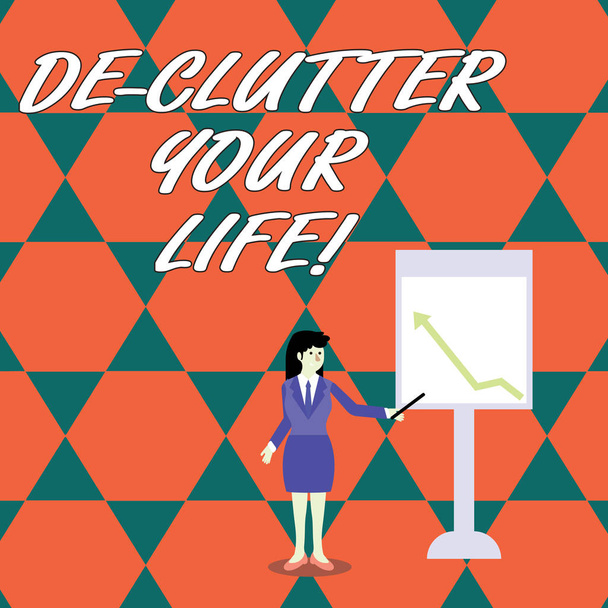 Word writing text De Clutter Your Life. Business concept for remove mess clutter from place organize and prioritize Businesswoman Holding Stick Pointing to Chart of Arrow Upward on Whiteboard. - Photo, Image