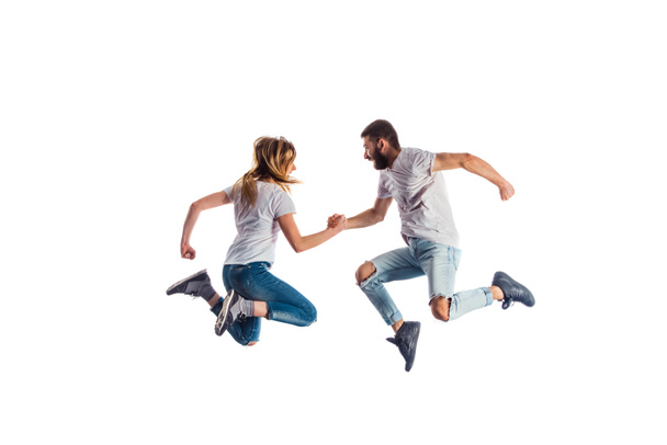 Couple jumping during training dances - Foto, afbeelding