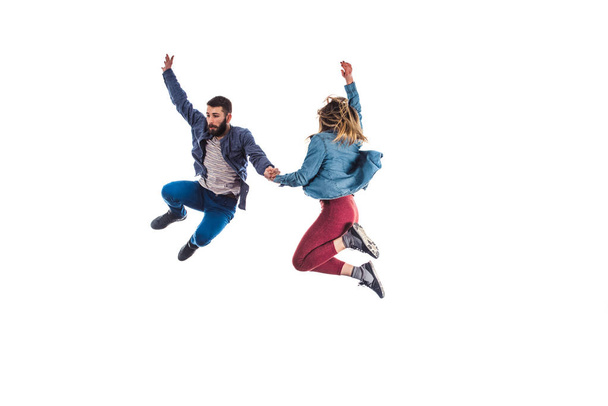 Paar springen tijdens de training - Foto, afbeelding