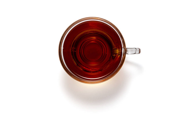 Top view photo of a black tea cup isolated on white background - Valokuva, kuva