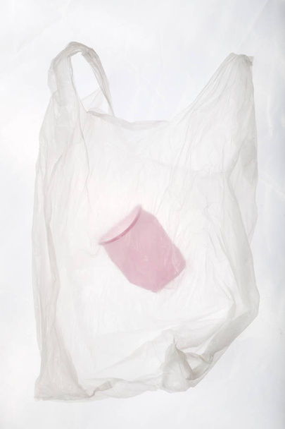 Single-use plastic waste, studio shot. Plastic pollution concept. - Photo, image