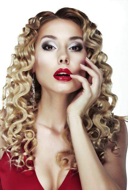 Glance. Frizzle. Sexy Bright Blonde with Curly Hair. Red Sensual Lips - 写真・画像