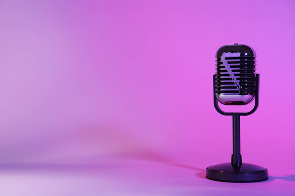 Retro microphone on color background. Space for text - Фото, зображення