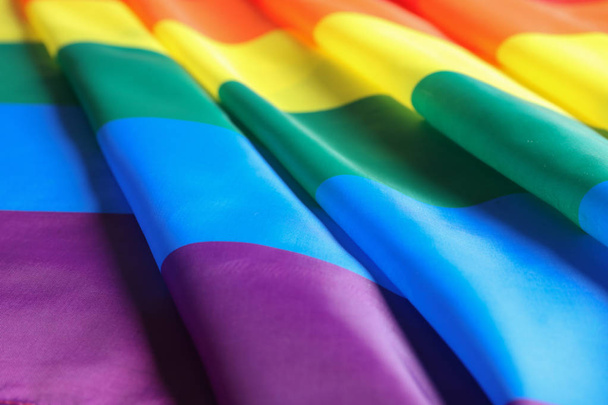 Bright rainbow gay flag as background. LGBT community - 写真・画像