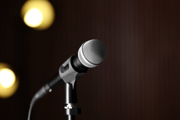 Microphone against festive lights, space for text - Foto, Imagen