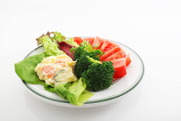 Healthy and delicious fresh vegetable salad - Фото, изображение