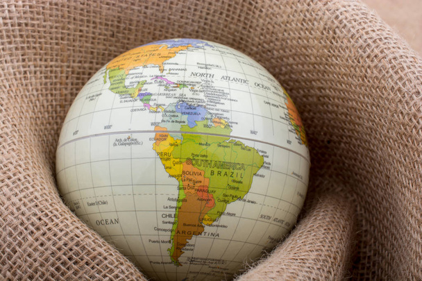 Linen canvas wrapped around a globe - Фото, зображення