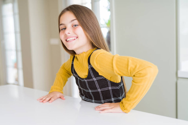 Beautiful young girl kid smiling confident and excited to the ca - 写真・画像