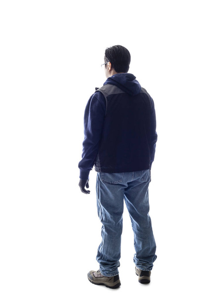 Mountain Climber or Hiker looking at a white background for composite.  The man is isolated and acting like he is looking at a view to depict outdoor activity and adventure. - Foto, Imagem