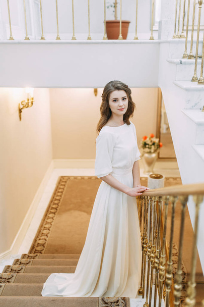 Light wedding photo shoot in European style. The bride before the ceremony at the registry office.  - 写真・画像