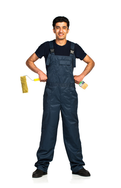 reparateur Arabische nationaliteit in de bouw overalls op een whi - Foto, afbeelding