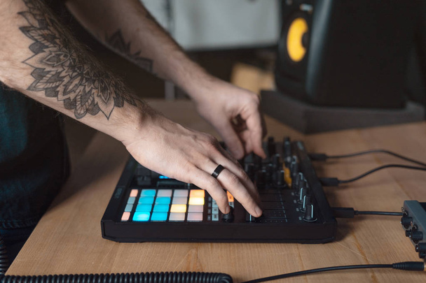 Dj man creates electronic music in the studio - Photo, Image