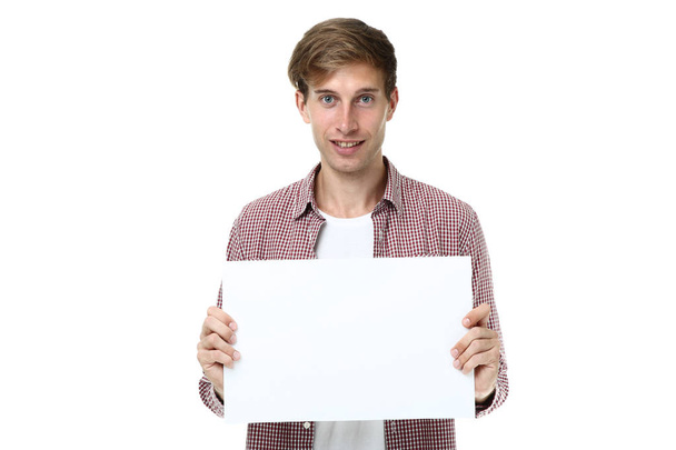 Beautiful young man holding blank board on white background - Foto, Imagem
