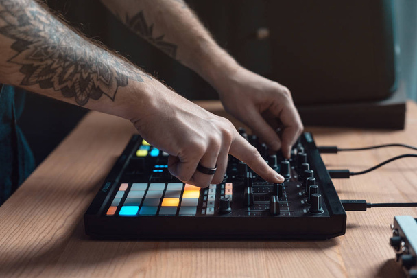Dj man creates electronic music in the studio - Foto, Bild