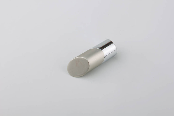 Modern metal ending for curtain pole on grey background - Foto, afbeelding
