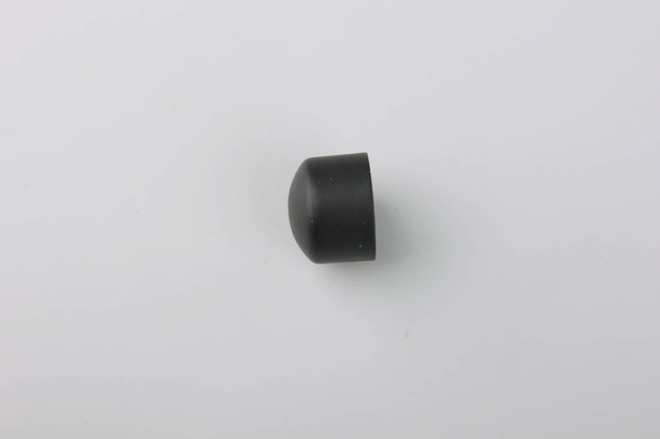 Simple metal tip for curtain pole on grey background - Fotoğraf, Görsel