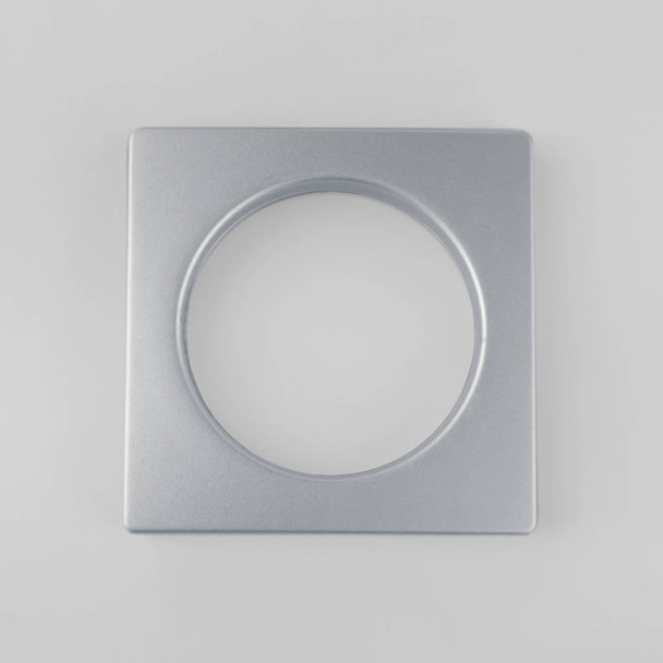 Curtain grommet square for cornice fixing on grey background - Photo, Image