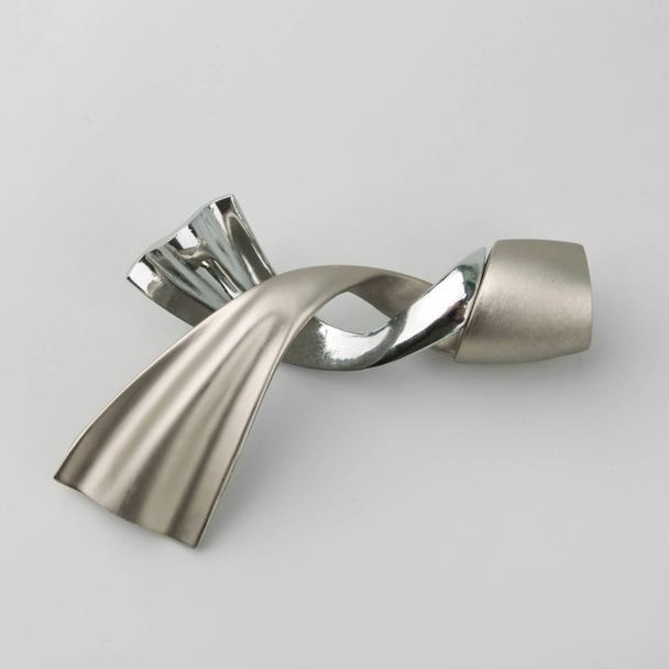 Twisted modern metal ending for curtain pole on grey background - Фото, зображення