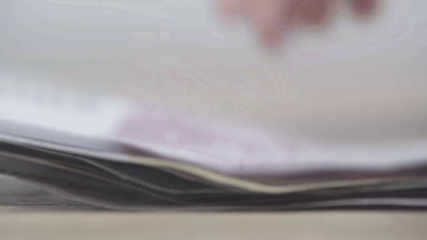 close up view of woman counting euro banknotes on table - Footage, Video