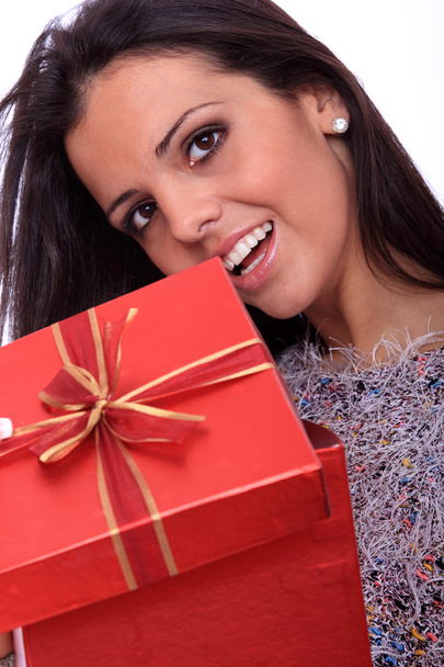 beautiful young smiling woman with a gift - Zdjęcie, obraz