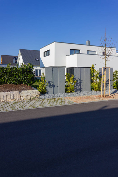 modern house building with green bushes  - Photo, Image