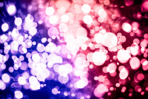 glittering shine bulbs lights background:blur of Christmas wallpaper decorations concept.holiday festival backdrop:sparkle circle lit celebrations display. - Foto, afbeelding