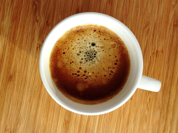 Bir fincan kahve, üst manzara. - Fotoğraf, Görsel