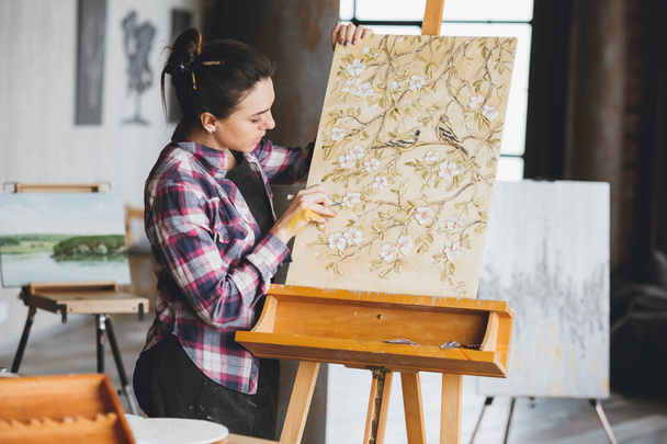 artist work studio woman painter canvas easel - Фото, изображение
