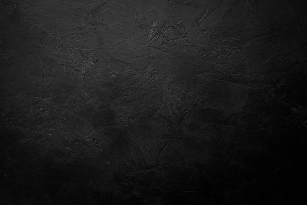 Black stone background. Black surface. Top view. Free space for your text. - Photo, Image
