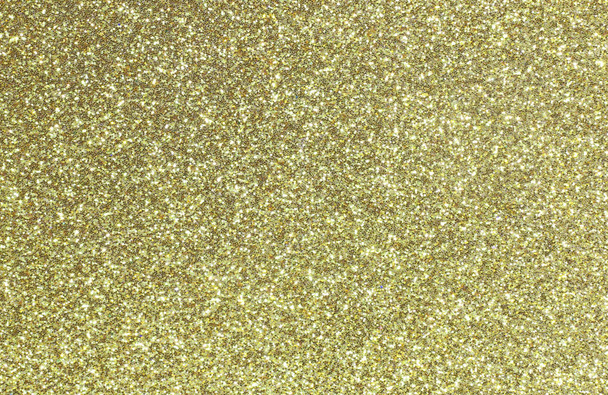 parlayan düzgün renkli sarı altın glitter arka plan - Fotoğraf, Görsel