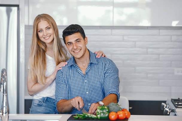 couple at home in a kitchen - Photo, Image