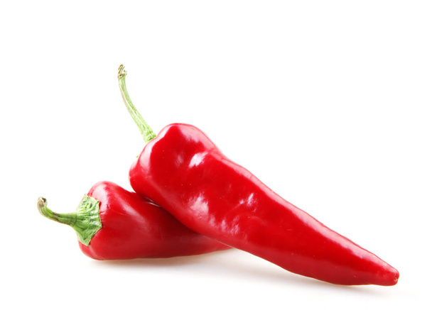 Close-up de pimenta vermelha contra fundo branco
 - Foto, Imagem
