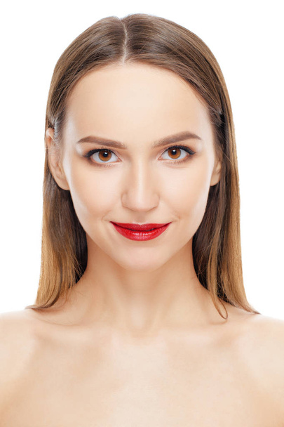 Close-up portrait of face of pretty girl with fresh healthy skin, natural makeup and red lips - Foto, Imagem