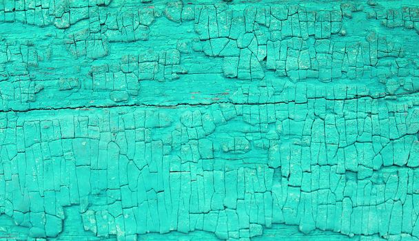 Fundo de madeira velho com restos de pedaços de restos de tinta velha em madeira. Textura de uma árvore velha, pintura de descascamento de fundo de madeira vintage. placa azul velha com tinta rachada - Foto, Imagem
