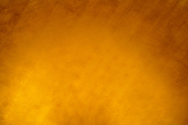 Αφηρημένη γκραντζ επιφάνεια πορτοκαλί χαλκό χρυσό φόντο Golden YEL - Φωτογραφία, εικόνα