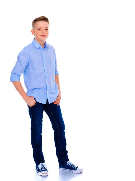 Portrait of a teenager boy in full growth. - Фото, изображение