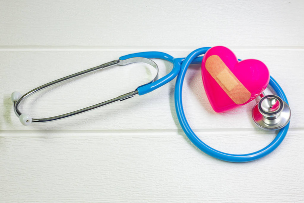 pink Heart and stethoscopes for medical content. - Photo, Image