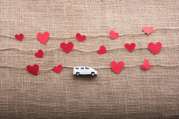  Love concept with car and heart shaped icons - Photo, Image