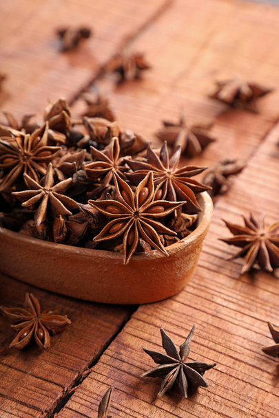Organic Indian Spice / Herb Star Anise in a Brown Bowl - Photo, Image
