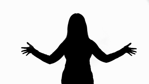 Vista frontal de silueta de mujer mostrando palmas y gestos aislados en blanco
 - Imágenes, Vídeo