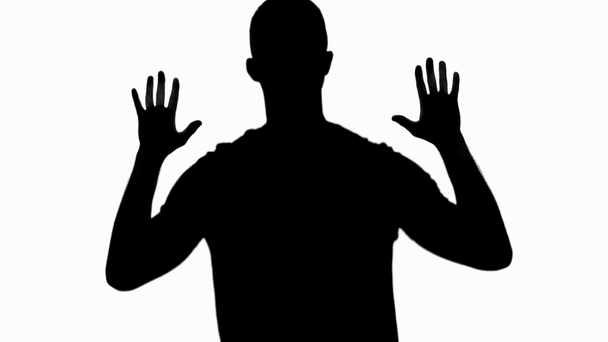silhueta do homem levantando lentamente as mãos isoladas no branco
 - Filmagem, Vídeo