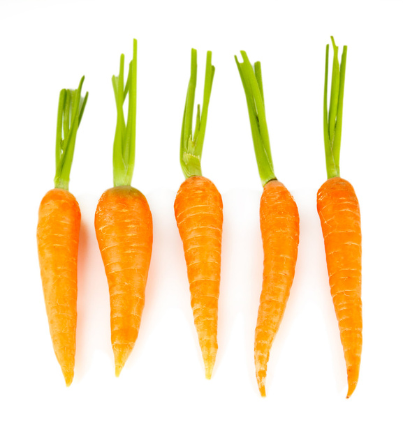 Heap of carrots, isolated on white - Fotoğraf, Görsel