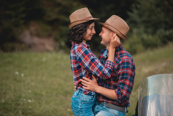 young happy female male couple hugging outdoors - Fotoğraf, Görsel
