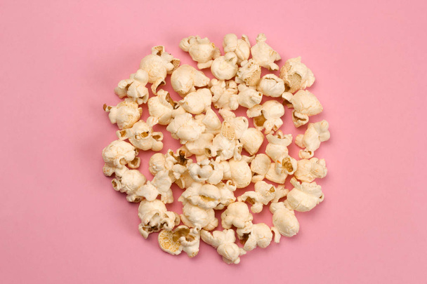 top view food fashion flat lay popcorn circle on a pink background - Photo, image