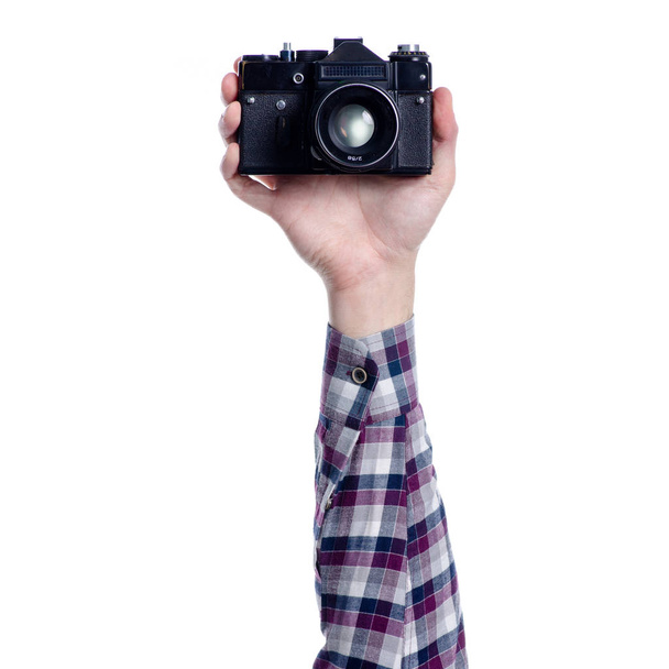 Old Photo camera in hand - 写真・画像