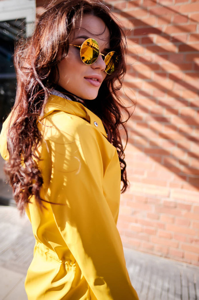 Attractive hipster young woman in stylish sunglasses in a stylis - Fotoğraf, Görsel
