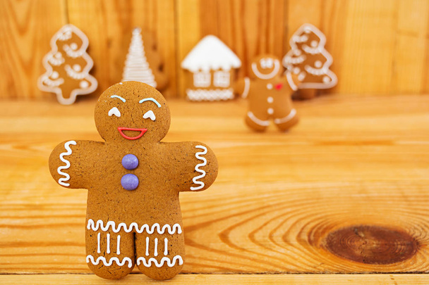 Christmas gingerbread cookies on wooden background - Photo, Image