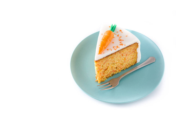 Sweet carrot cake slice isolated on white background. Copyspace - Фото, изображение