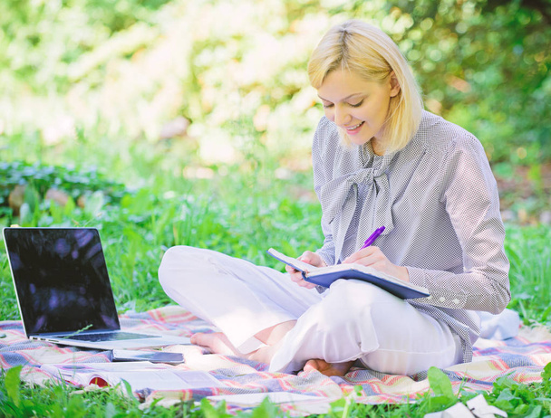 Business lady freelance work outdoors. Become successful freelancer. Freelance career concept. Guide starting freelance career. Managing business outdoors. Woman with laptop sit grass meadow - Foto, afbeelding
